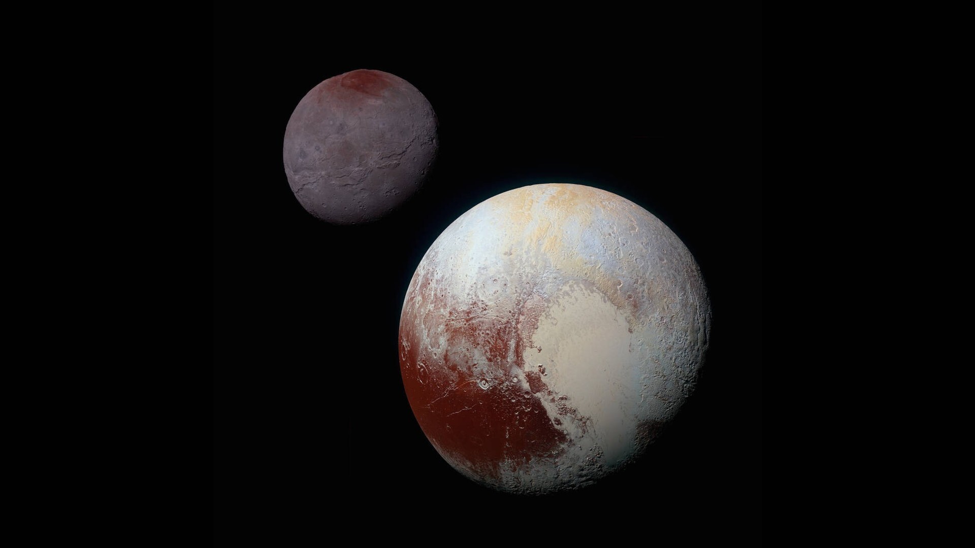 O parceiro do planeta anão de Plutão, Charon, pode ter derramado suas entranhas para criar 2 das luas do par