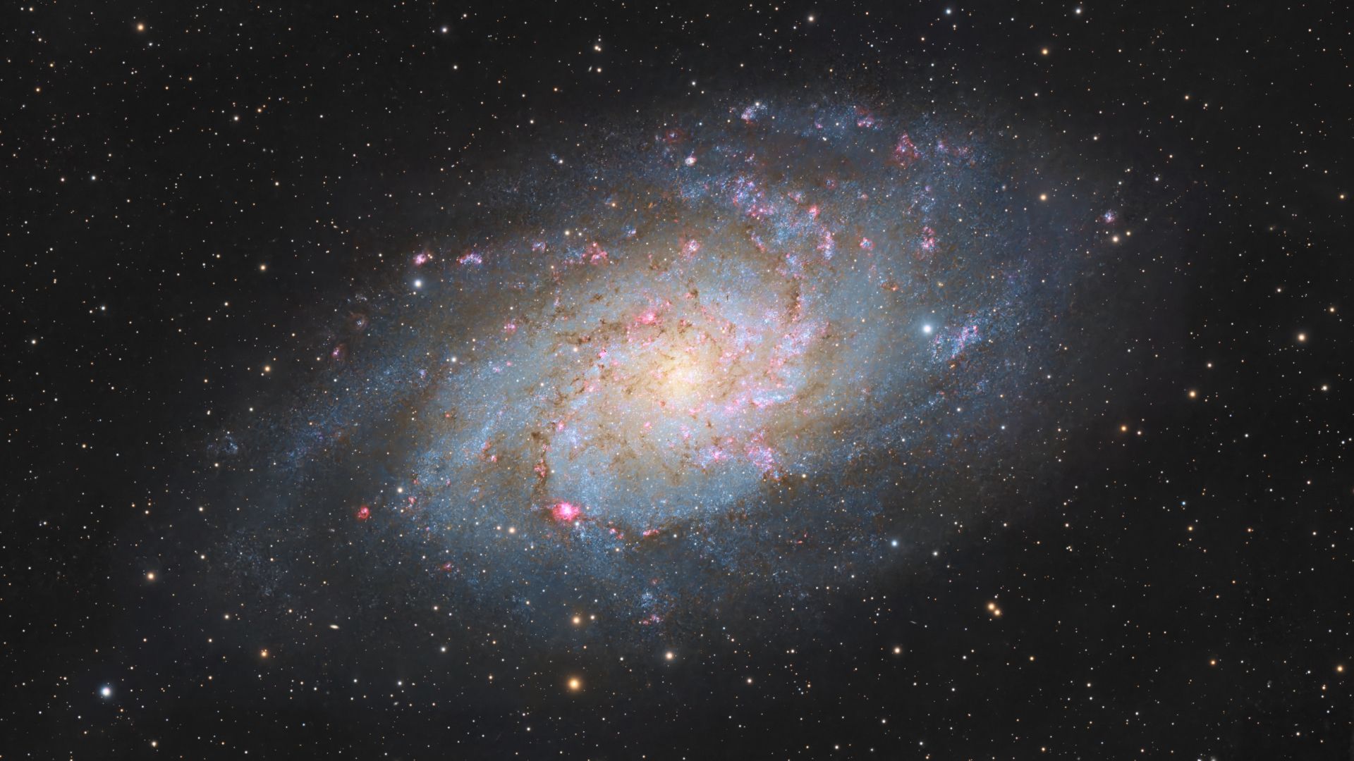 Astrofotógrafo espiona uma galáxia espiral repleta de nascimentos estelares (foto)
