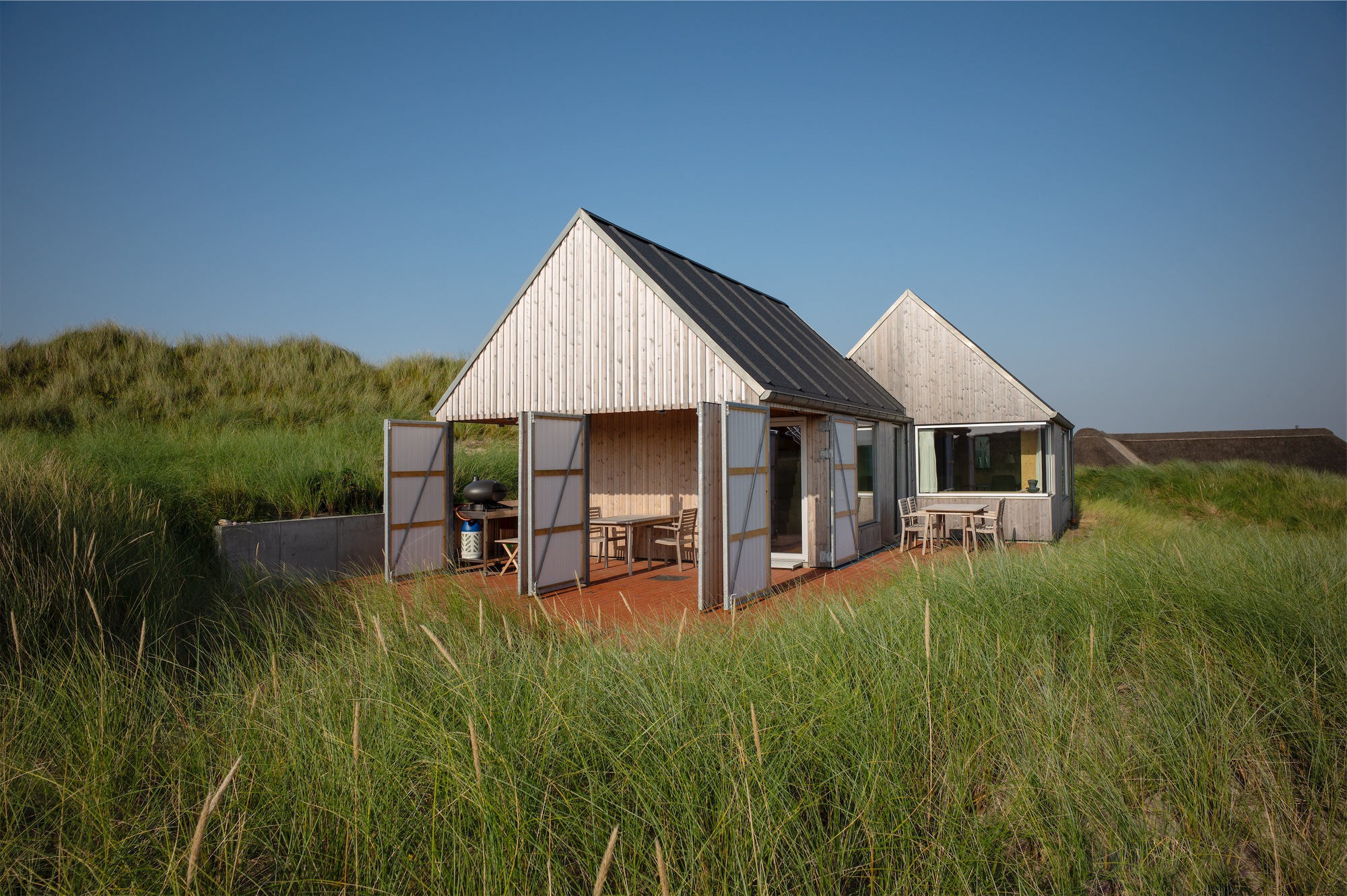 Casa de verão em Klegod / Spant Studio