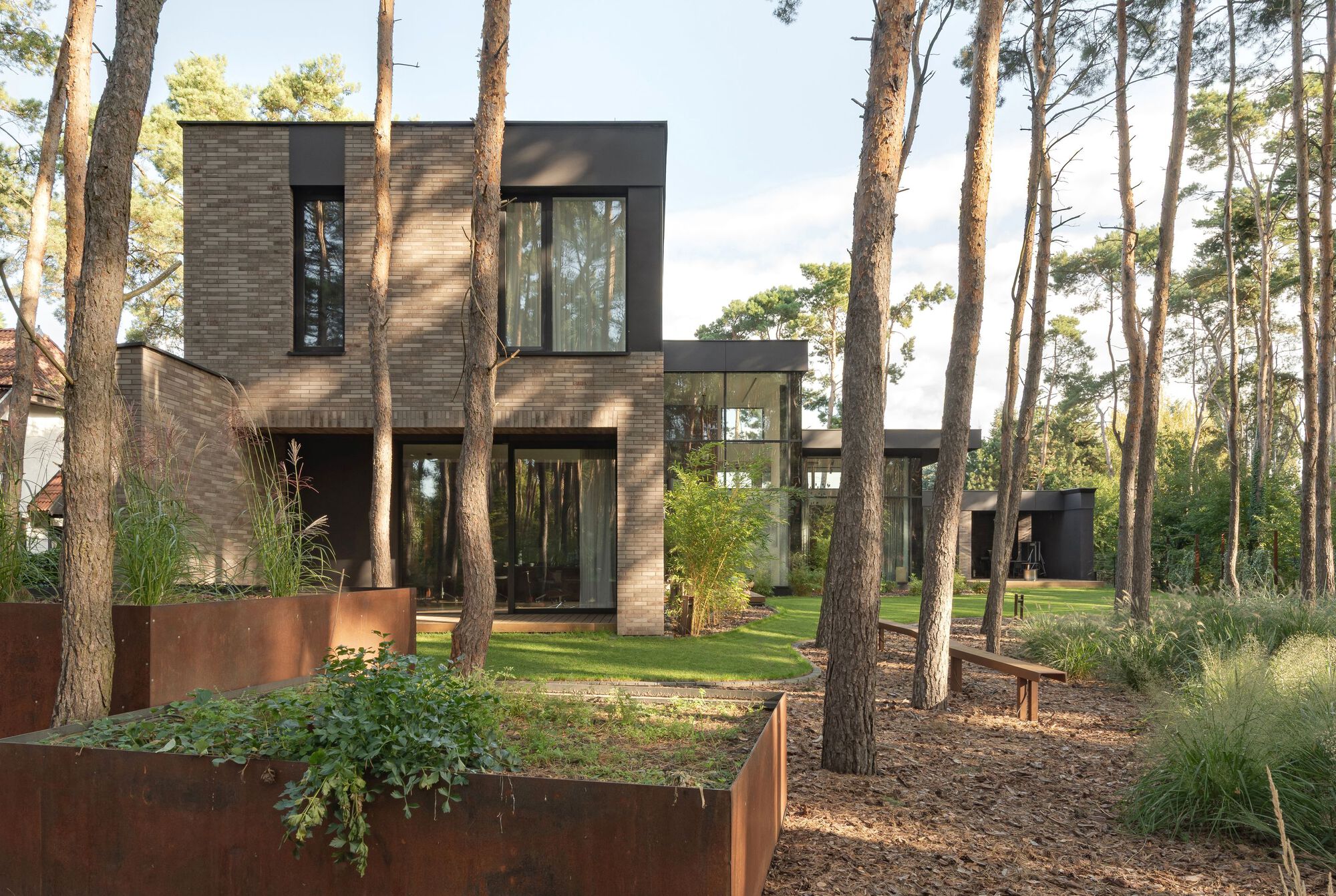 Casa entre as árvores / Wrzeszcz Architekci + mode:lina