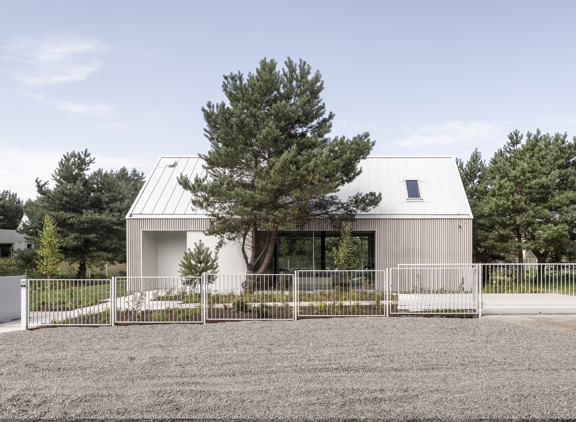 Casa no Lago Kownatki / Archmondo